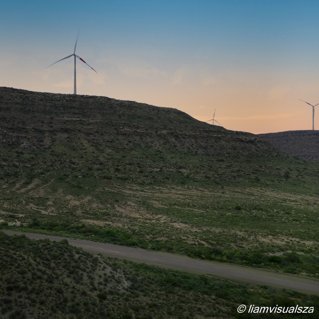 Wind turbines at sunset